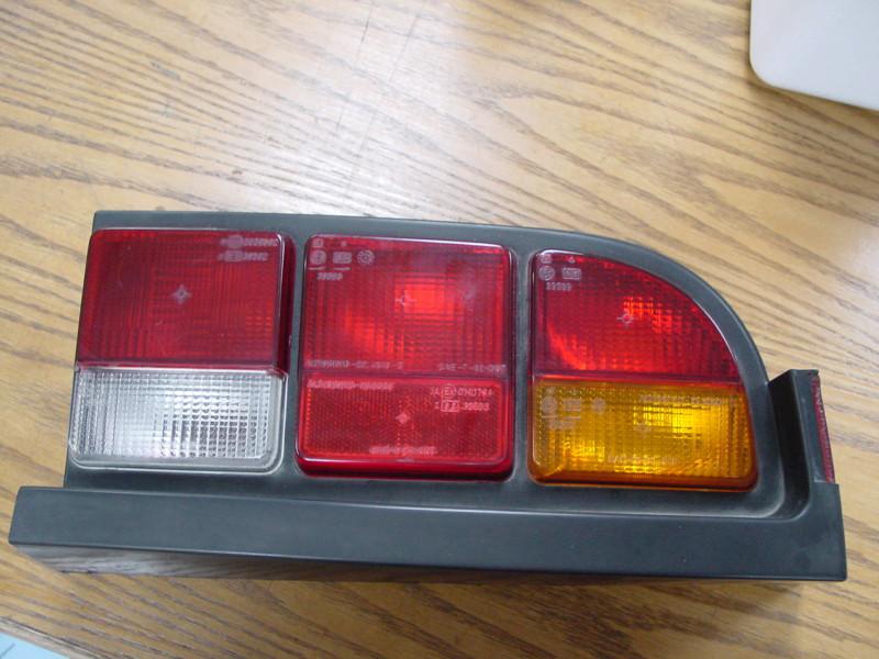 Alfa romeo spider tail light lense assembly p/s r/h side used