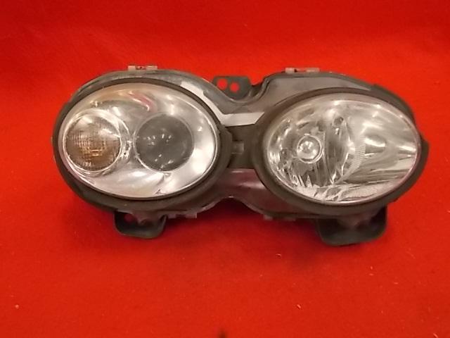 Jaguar x type head light assembly passenger  side fair cosmetic condition