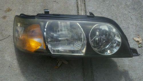 Infiniti.q45 right side passanger xenon headlight  cracked lense