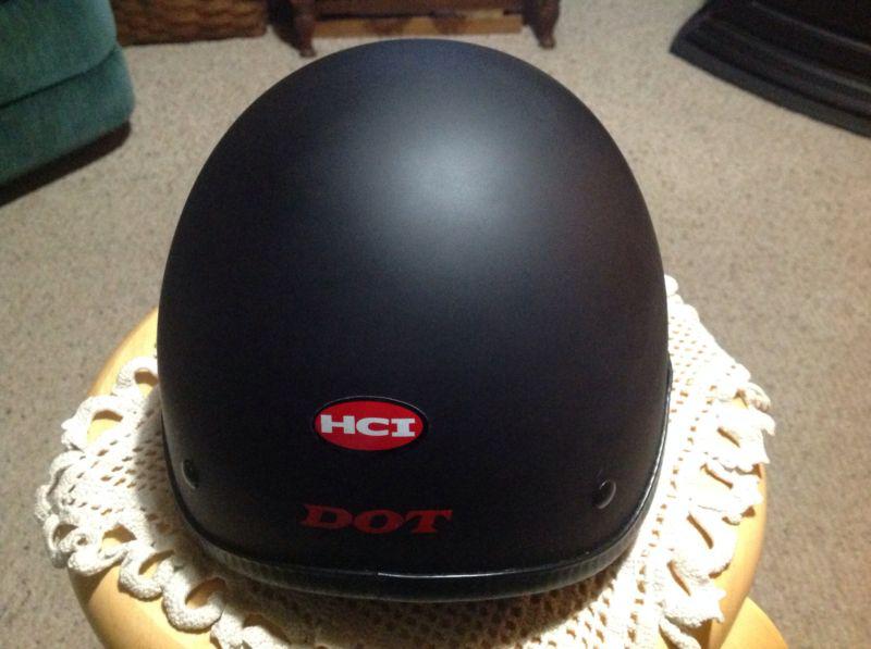 Medium hci half helmet, matte black, slight use.  #2