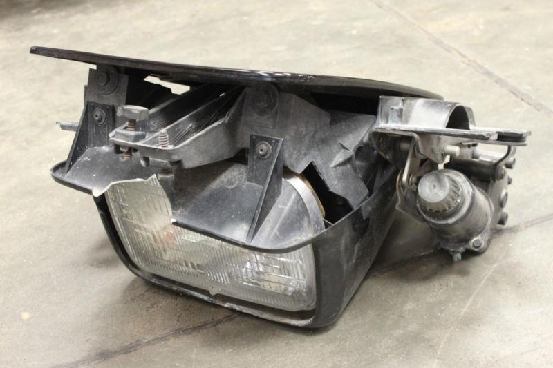 88-96 corvette c4 black lh driver side headlight w/ motor used oem