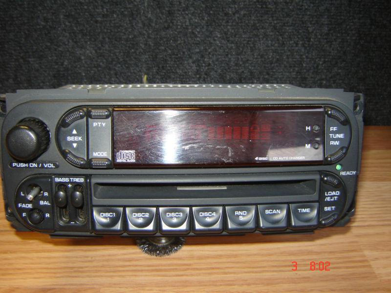 Oem factory chrysler 4 disc cd player w/ am fm radio mr587284