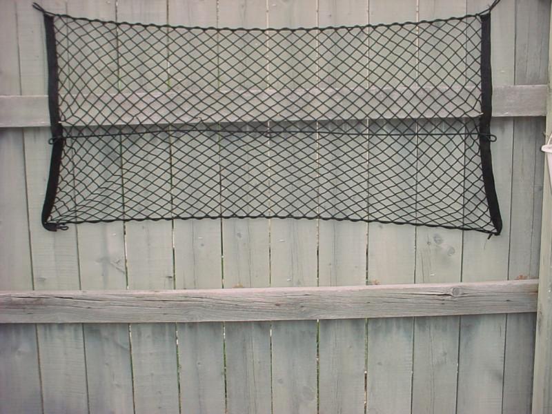 98-04 cadillac seville sts sls factory trunk, hold down cargo net for storage