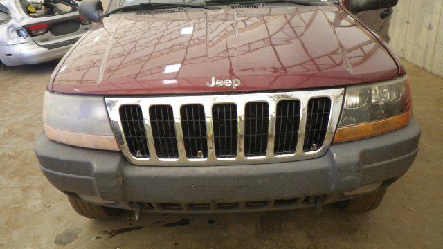 99 00 01 02 03 04 jeep grand cherokee l. headlight 1446451