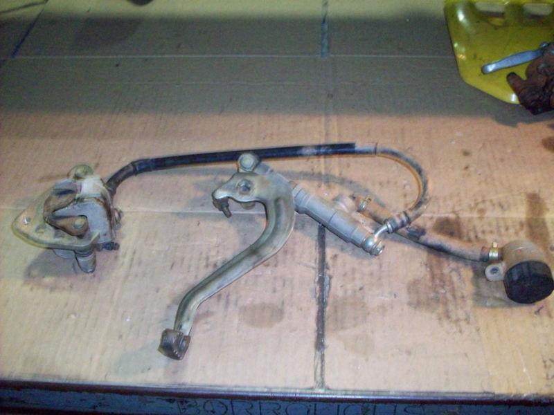 1999 suzuki rm80 rear brake caliper & master cylinder assy complete