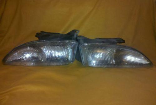 97 chevy cavalier headlamp 