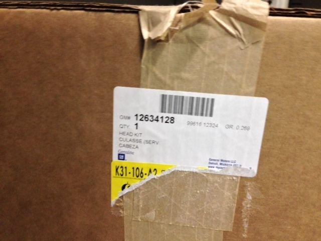 Brand new in box genuine gm head kit 12634128 oem