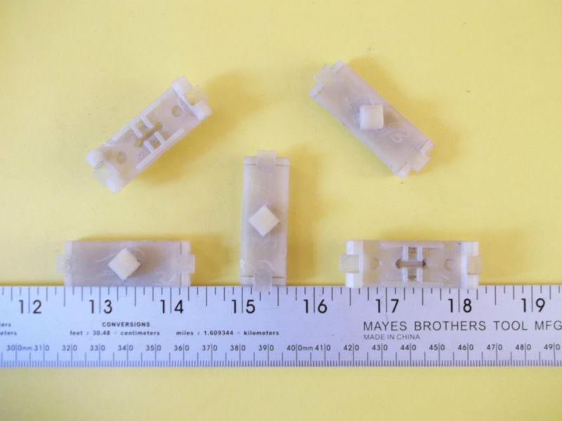 Early (nylon) moulding fasteners