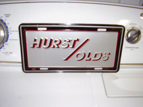 Hurst olds  license plate part