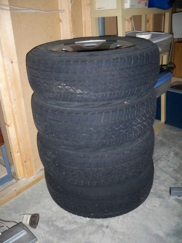 4 used yokohama p235/70r17-108s radial tubeless tires and custom rims - $400 (ch