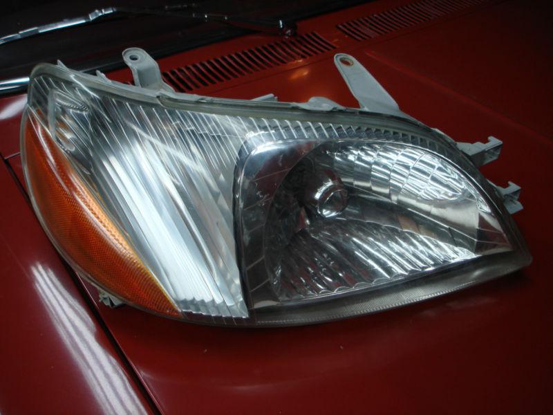 00-02 toyota echo headlight right passenger