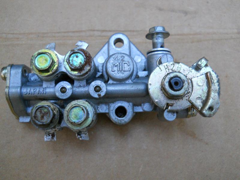 Kawasaki h2 750 1974 1975 h2b h2c 750  oil injection pump in excellent condition