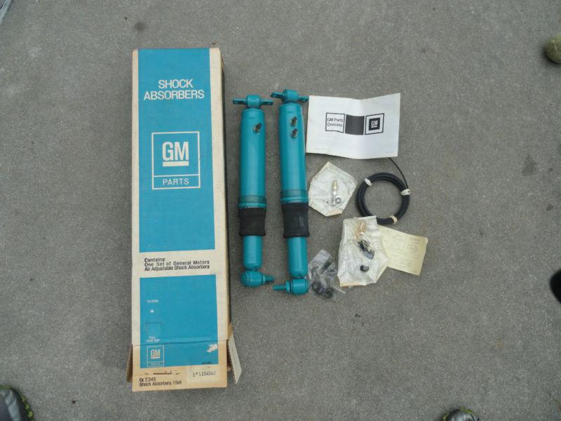 Nos cadillac  air lift shocks set 77-79 1154562