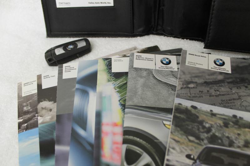 2006 bmw m5 partial books w/ case 