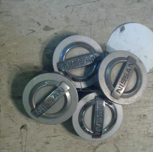 Nissan sentra 2006 set of 4 center wheel hub caps