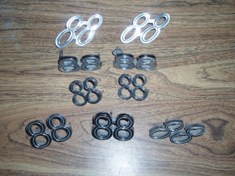 Oldsmobile delta 88 number emblems lot of 9 1960's 1970's