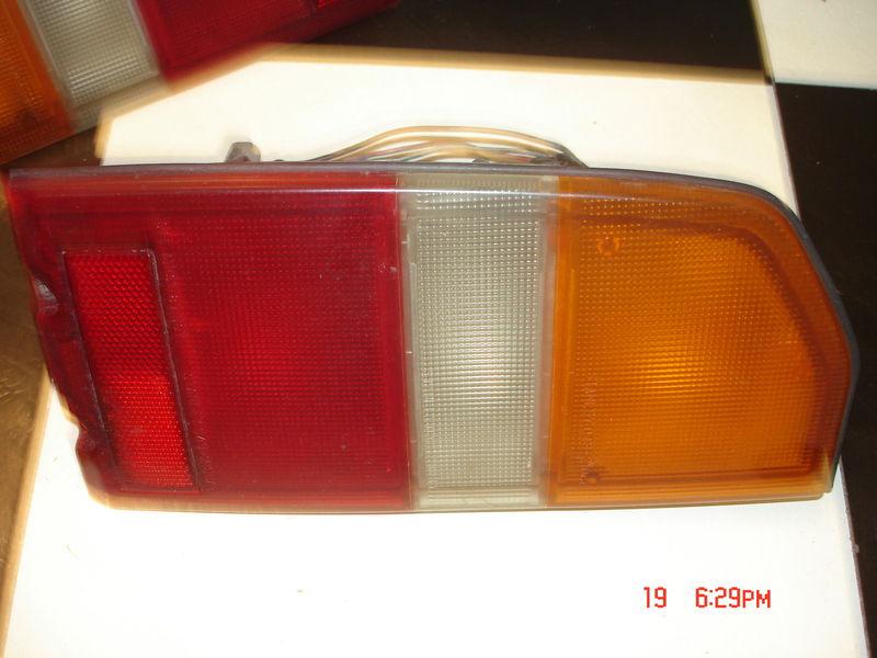 88-98 tracker sidekick rear driver brake tail light oem