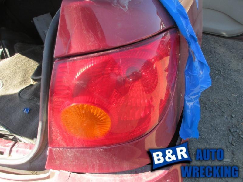 Right taillight for 03 04 toyota corolla ~   thru 4/04 red and amber 4931354