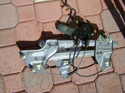 91-95 acura legend coupe left rear window motor & regu.