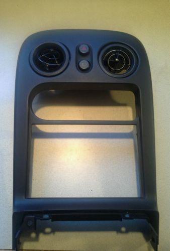 1994-1997 mazda miata tombstone radio surround with vents and switches like new 