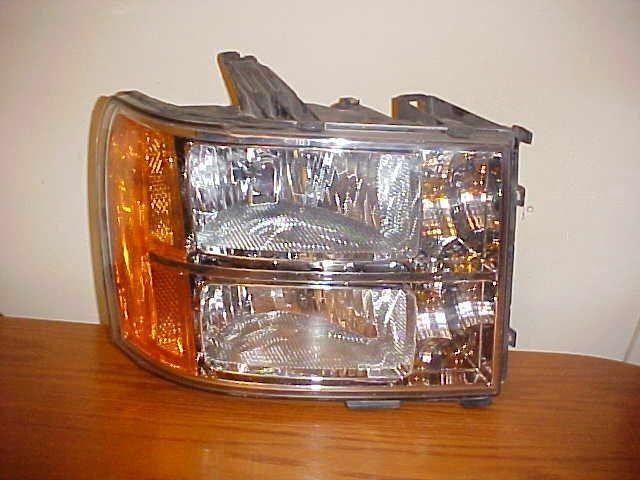 07-11 gmc pickup rh passenger front headlight assembly part# 25799194