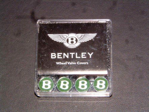 Bentley accessories new in box green/silver valve caps. new in a boxed set of 4.