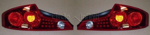 New oem infiniti g35 coupe left &amp; right tail lights 2003-2005