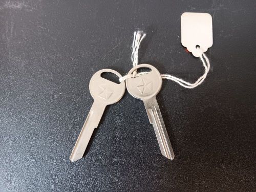 Pair of blank chrysler car keys