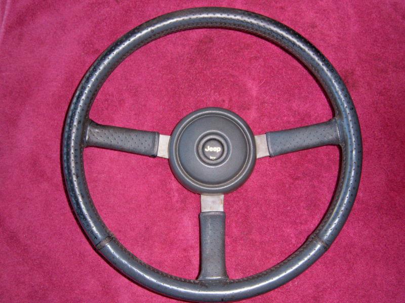 Jeep  steering wheel gray complete  free fedex ground shipping !!