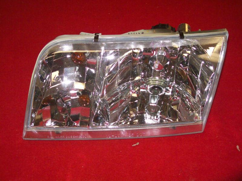 1998-2009 crown victoria right headlight with bulbs new in box eagle eyes