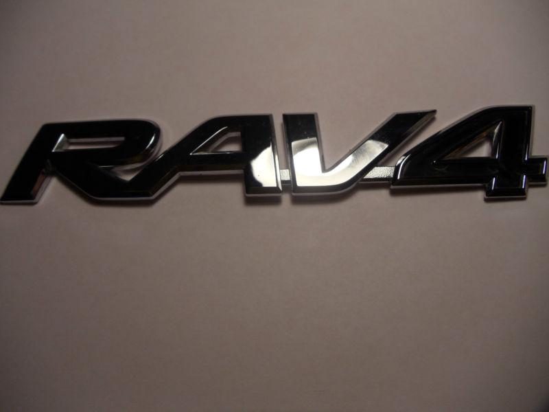 2011 toyota "rav4" tailgate emblem....... used