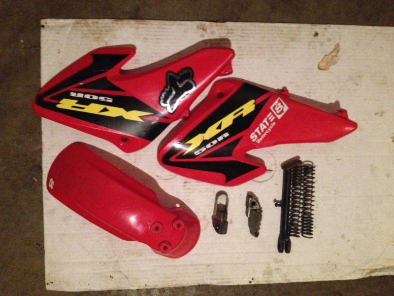 2000 honda xr 50 low mile oem body parts lot, panels,fender,pegs, springs & more