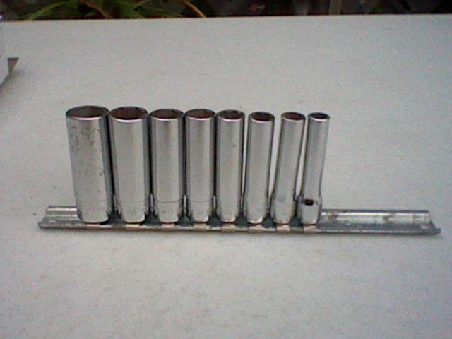 Snap on set of (9) standard 1/4" drive 6 point deep sockets on rail