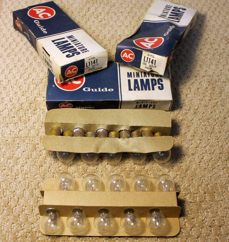 3 boxes nos ac guide l1141 light bulbs in original boxes ( 30 bulbs)