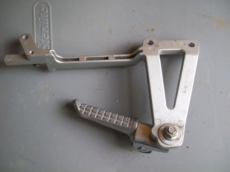 2007 kawasaki ninja 250r left rear foot peg and bracket