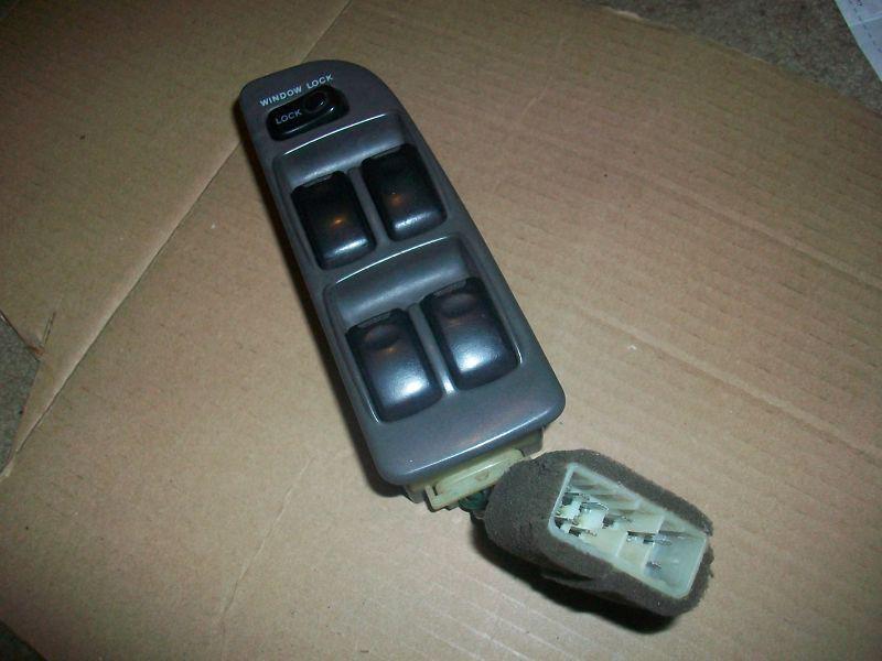 95-96-97 only  kia sportage 4dr master power window switch lh drivers gray