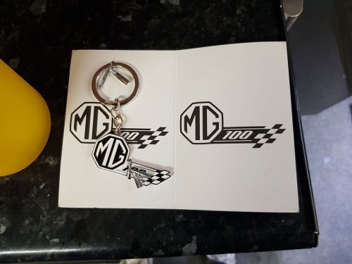 Mg 100 years anniversary keyring and yellow mug /cup