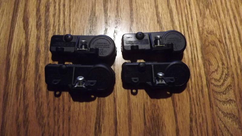 Gm tire pressure sensors (4) set 25799331