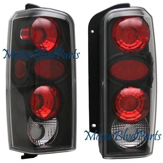 97-01 cherokee black tail lights rear brake lamps pair