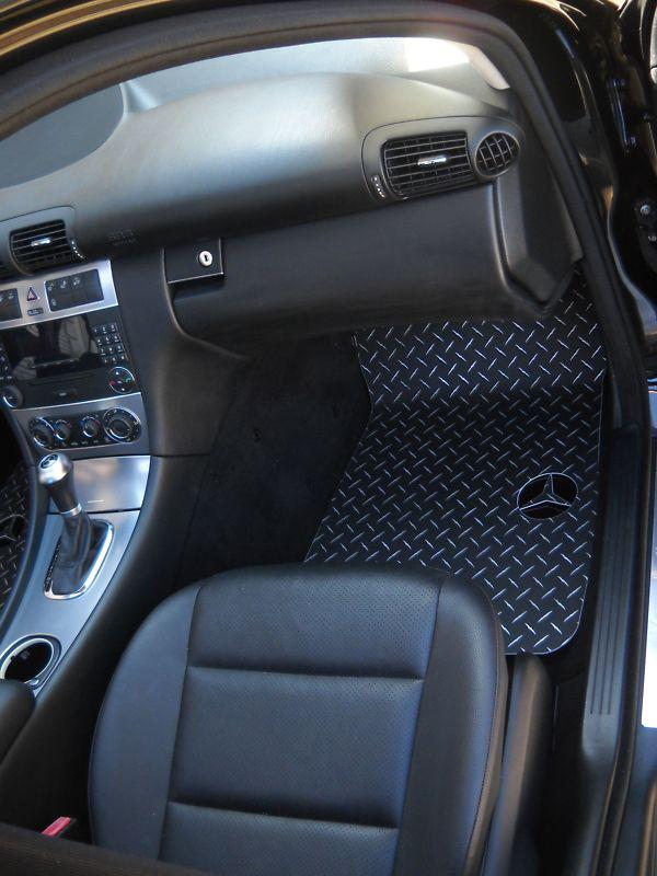 C class aluminum floor mats with logo cutouts.  real diamond plate metal set