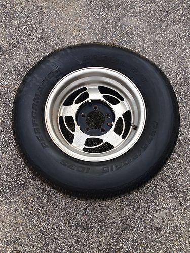 Set of (4) 15x8 p275/60 r15 chevy rims and tires 5 lug (modern) good rubber