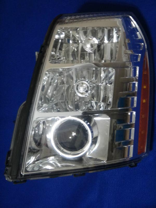 07-11 oem cadillac escalade xenon front left headlight missing 3 bolt brackets