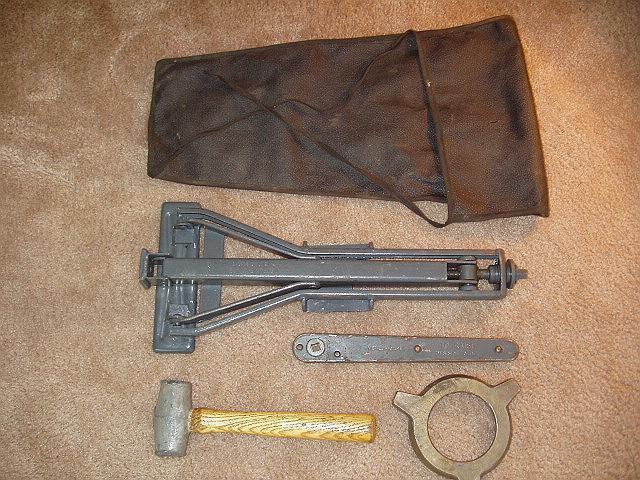 Jaguar tool kit includes bag, jack, jack handle, knockoff tool, hammer