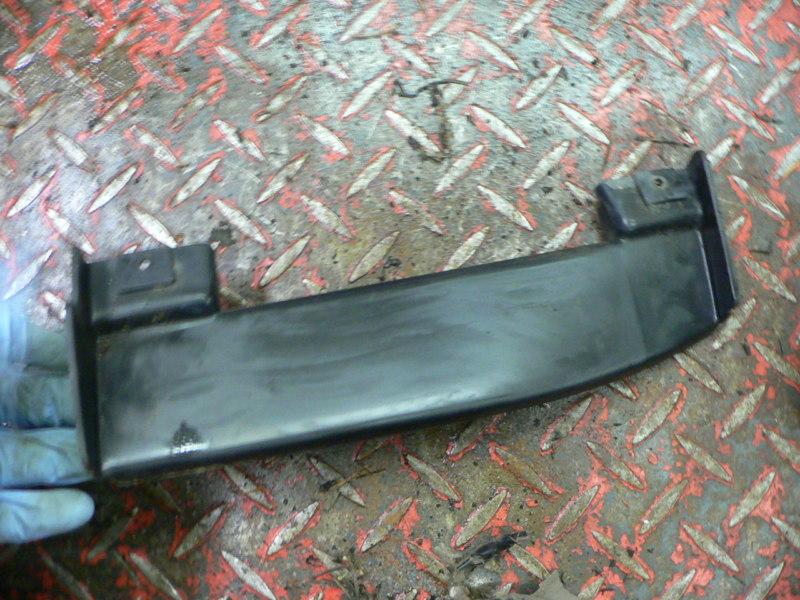 84 pontiac fiero left lower headlight trim part