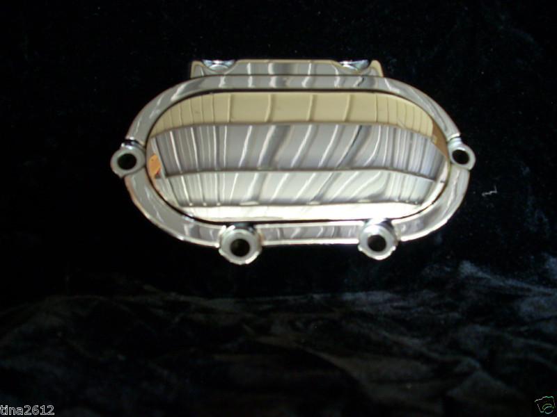 Harley-davidson transmission end cover. #37082-99 chrome oem. w/ dips.99'-05'