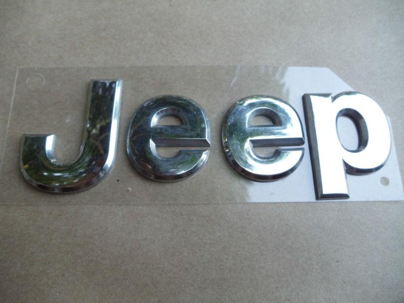 Mopar 055157088ac 2005-2013 *jeep* .hood emblem.....used