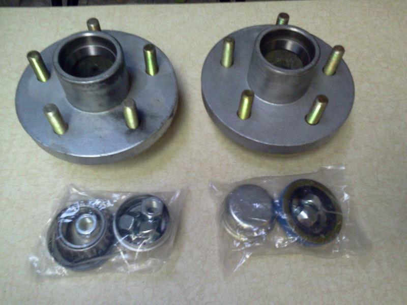 (2) boat trailer hot dipped galvanized hub 5 bolt on 4 1/2 w/bearing kits...