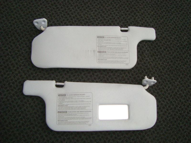 97 98  toyota rav4 sunvisors pair left and right   grey  oem 