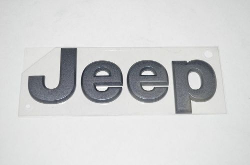 Jeep grand cherokee 68207203ab oem mopar nameplate emblem gunmetal grey new