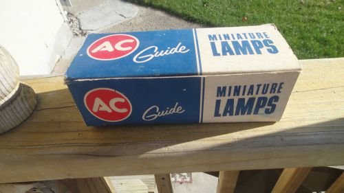 Gm  ac  guide  miniature lamps l 1143 vtg auto lamps 12 volt new old stock  nib
